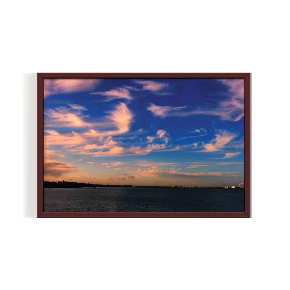 The Dancing Clouds Dublin brown framed print by Arts Fiesta