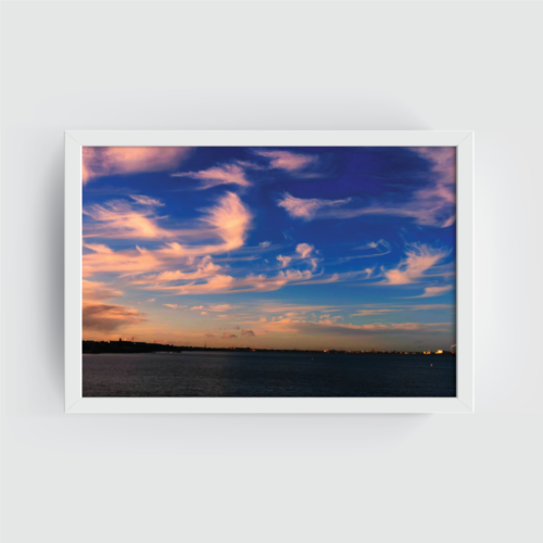 The Dancing Clouds Dublin white framed print by Arts Fiesta