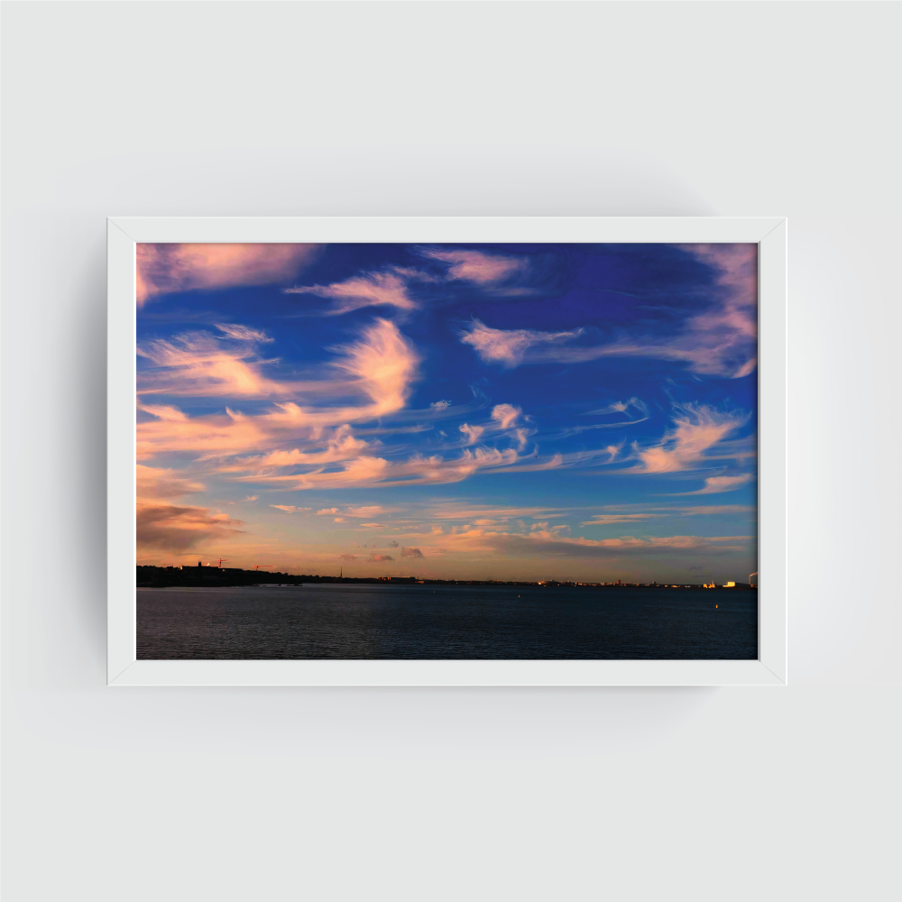 The Dancing Clouds Dublin white framed print by Arts Fiesta