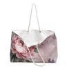 Carry nature’s beauty with you in our Wildflower Weekender Tote Bag. Featuring a boho floral print, durable straps, and spacious design—perfect for travel, beach days, or everyday adventures in style.