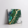 Top-view abstract Amazon rainforest wall art in a stretched canvas, featuring flowing shades of green, deep blues, cloudy textures, and a golden path—lush and tropical canvas print inspired by aerial jungle views. Perfect for eco-modern, biophilic, earthy-boho, and tropical interior decor. A vibrant, nature-infused statement piece for mindful living.
