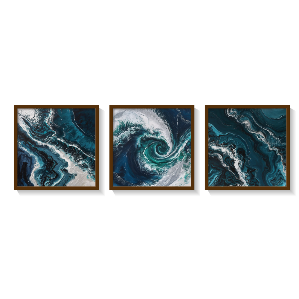 Set of 3 abstract Pacific Ocean paintings in shades of blue and white, featuring fluid wave patterns and framed in sleek brown frames.
