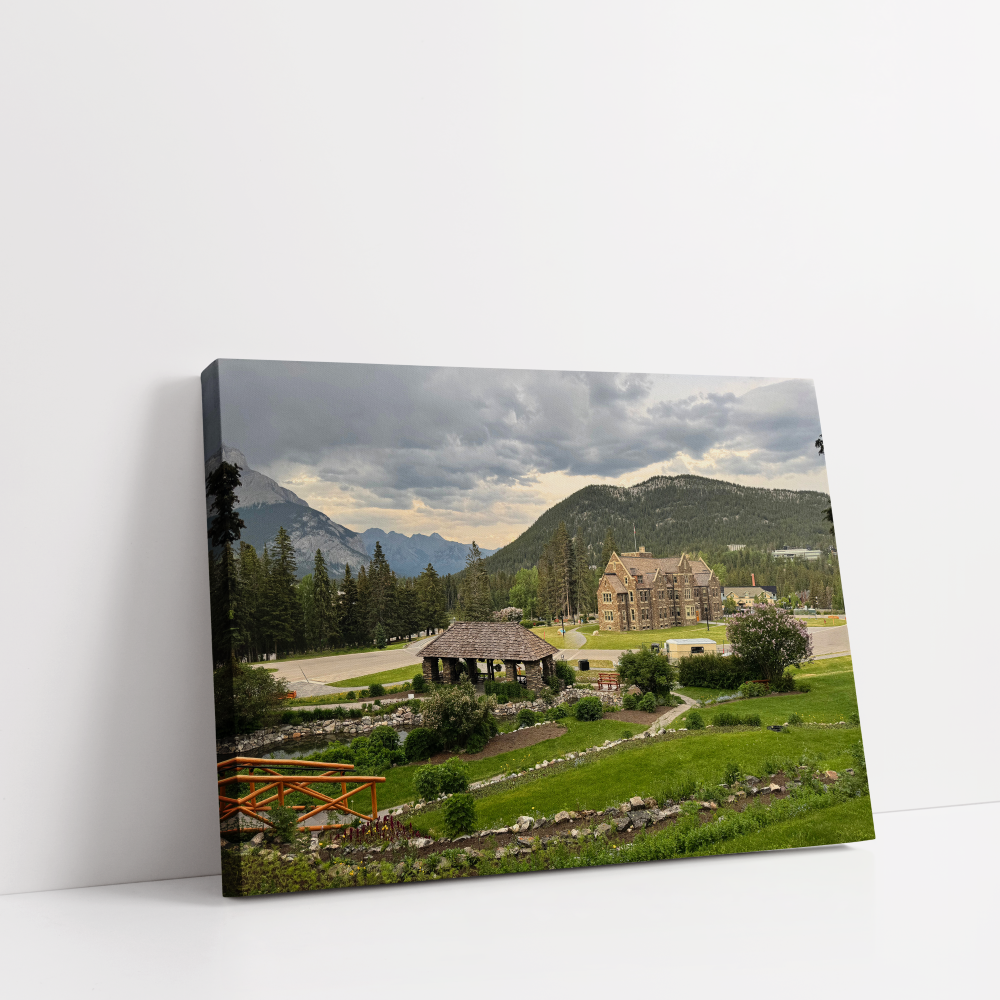 Horizontal Banff cityscape stretched canvas showing sweeping landscape of Banff city and Rockies