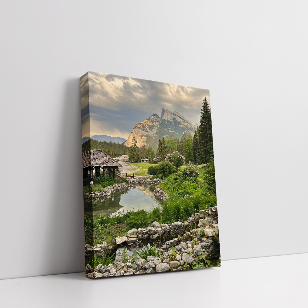 Vertical Banff cityscape stretched canvas showcasing Alberta town with dramatic sky and forest