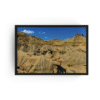 Horizontal black-framed photograph of expansive Badlands landscape at Dinosaur Provincial Park in Alberta.