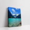 Stretched canvas print of Lake Louise with vivid turquoise lake and mountain peaks.