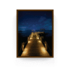 Espresso-framed Caribbean night pier print with glowing lights and ocean backdrop, Nizuc Resort.