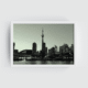 White-framed black and white Toronto skyline print with CN Tower, Rogers Centre, and lake foreground.