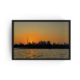 Toronto skyline at sunset photography in a sleek black frame, featuring the CN Tower and golden hour over Lake Ontario, perfect for modern cityscape wall art décor.