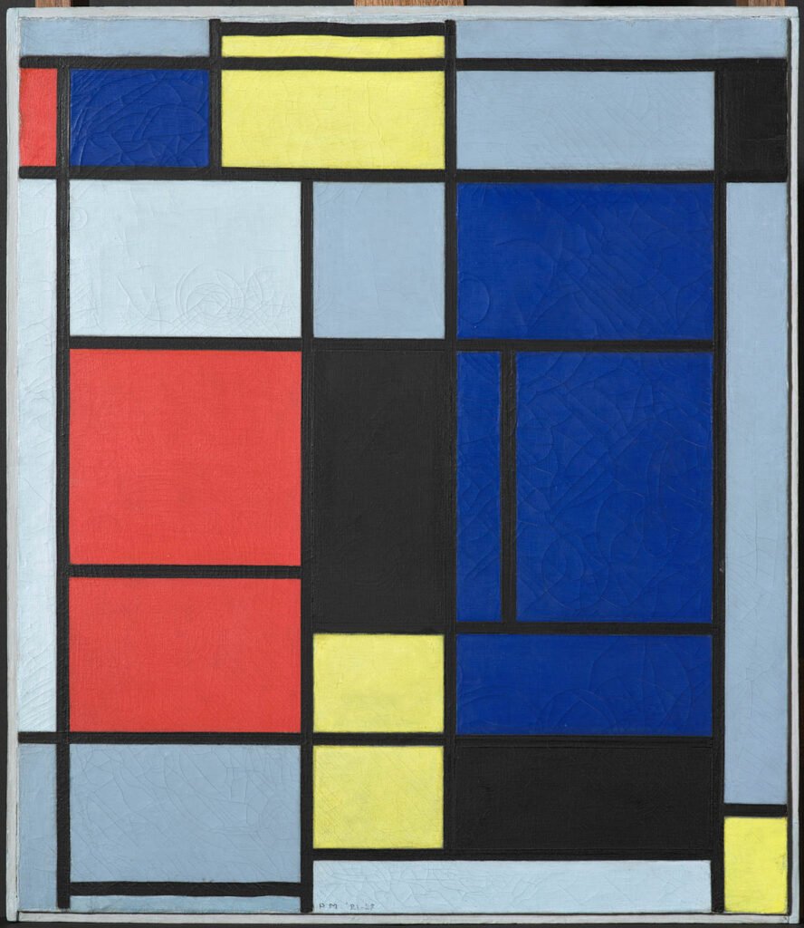 Artist: Piet Mondrian.​
Year: 1921.￼​
This defining piece solidified the artist's signature style of using mathematical precision to separate panels of primary colors with thin black lines.￼​