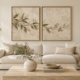 Two-piece olive branch canvas print set with realistic plaster relief effect in blonde oak floating frames above a neutral living room sofa